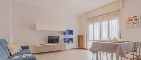 Apartment, 1 Bedroom | Living area | TV