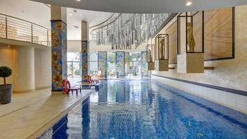 Indoor pool, open 5:00 PM to 10:00 PM, free cabanas, sun loungers