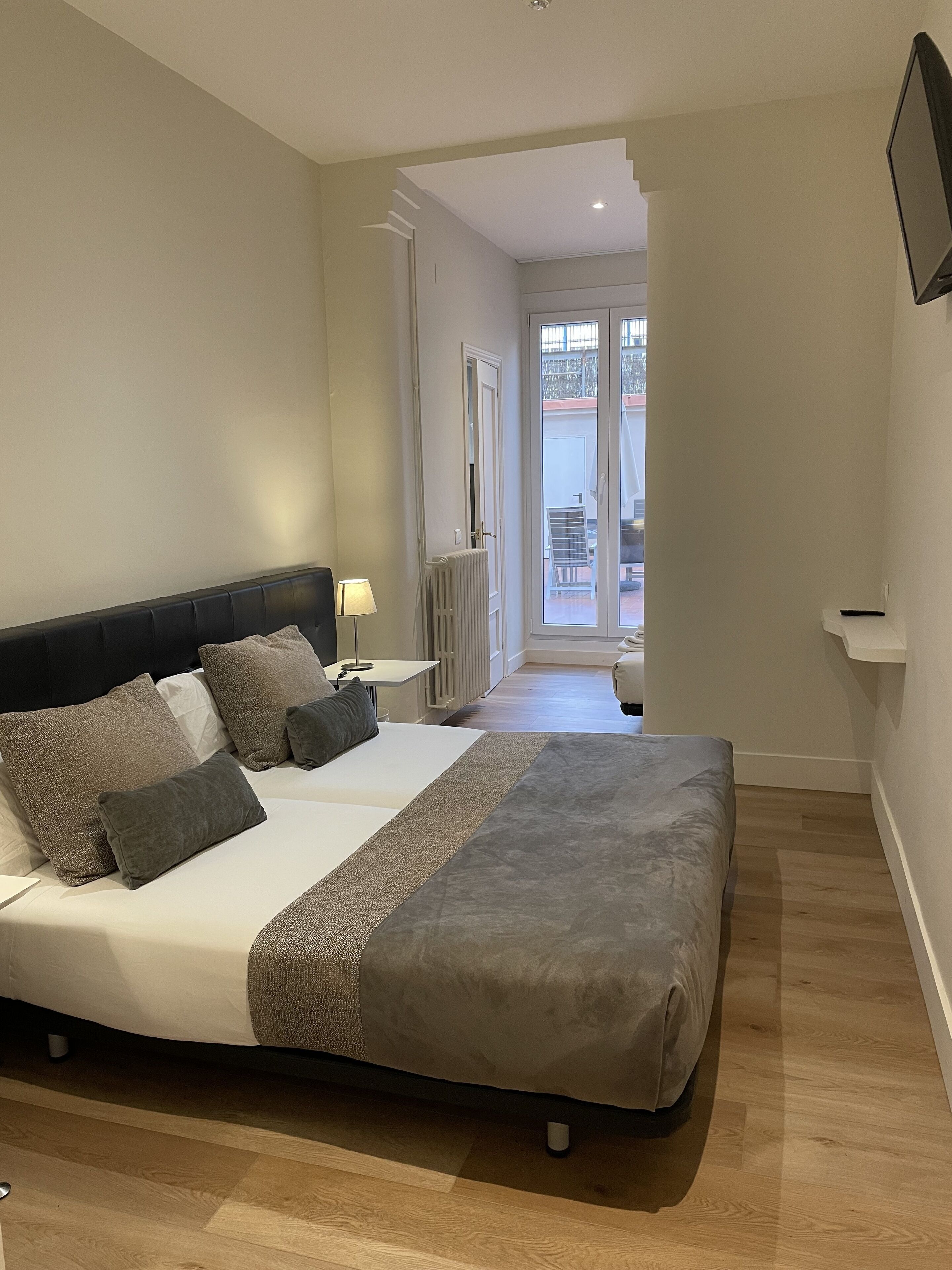 Habitación triple | Caja fuerte, cortinas opacas, sistema de insonorización