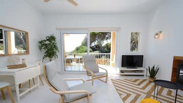 Standard Apartment, 2 Bedrooms, Terrace, Partial Sea View | Living area | 42-inch flat-screen TV with cable channels, TV