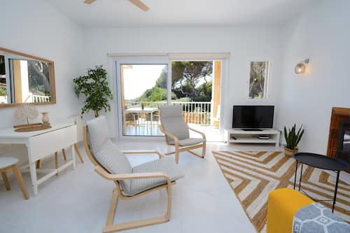 Standard Apartment, 2 Bedrooms, Terrace, Partial Sea View | Living area | 42-inch flat-screen TV with cable channels, TV