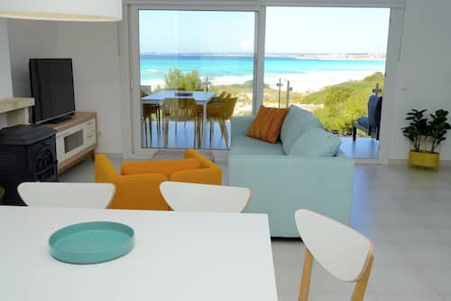 Departamento, 4 habitaciones, Terraza, vista al mar | Área de sala de estar | Televisión de pantalla plana de 42 pulgadas con canales por cable