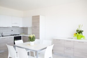 Apartment, Multiple Beds, Sea View | Living area | LED TV - Airone Residence (Zambrone)