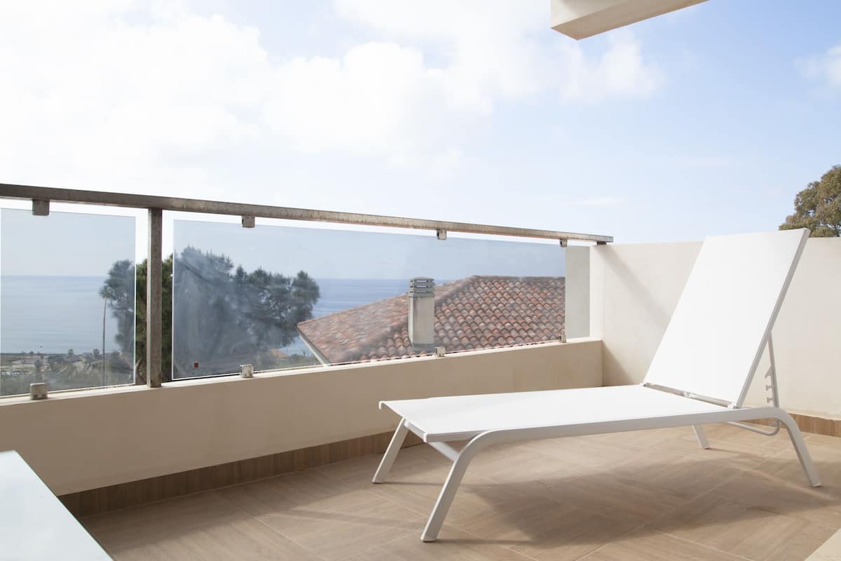 Appartement, meerdere bedden, uitzicht op zee | Balkon