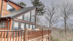 A wooden cabin with a deck and large windows. - Lonesome Dove (Blue Ridge)