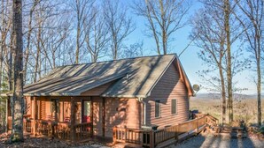 A cabin with a porch, a deck, and a satellite dish. - Cabin Sweet Cabin (Blue Ridge)