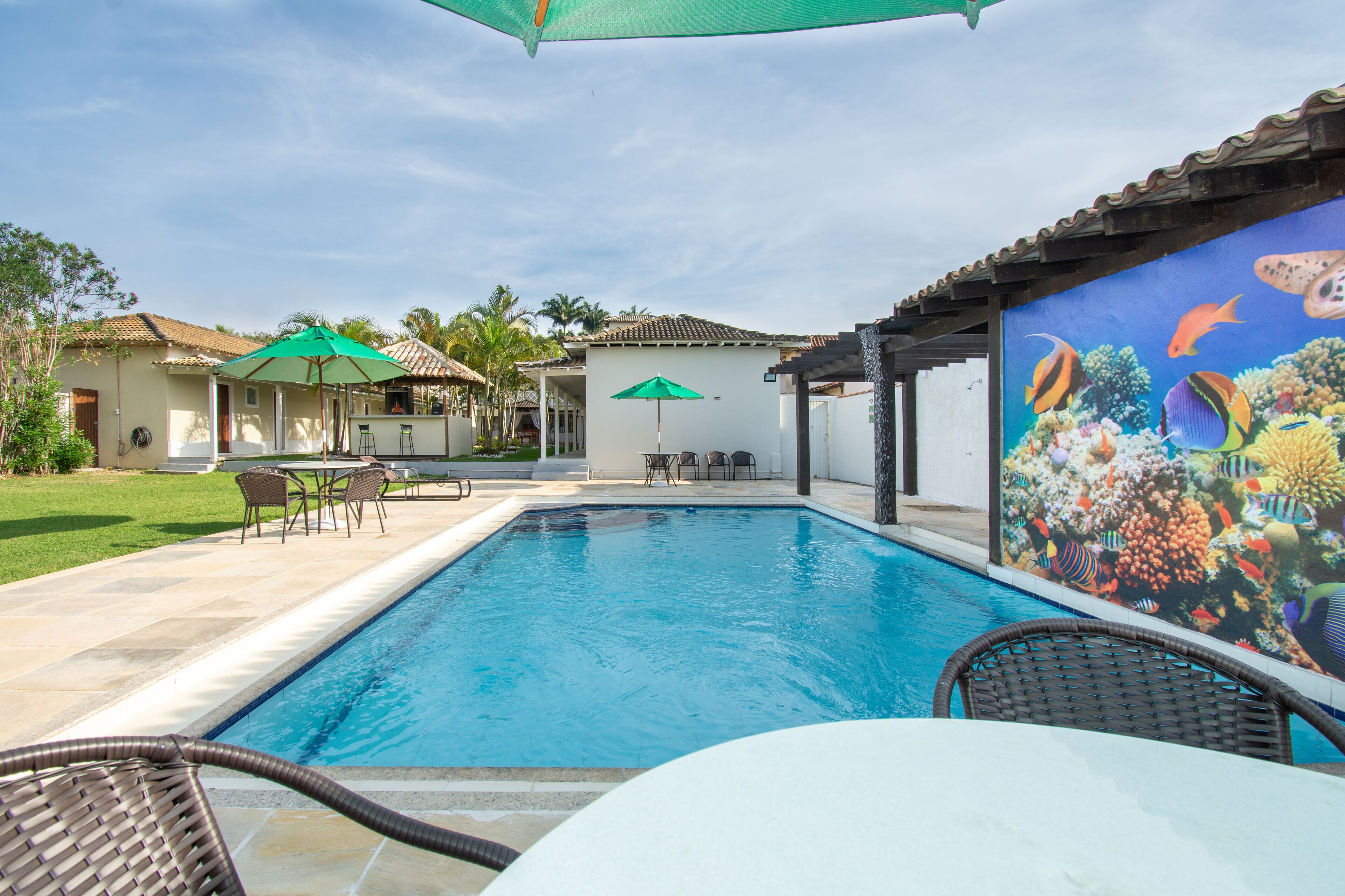 Outdoor pool, pool umbrellas, pool loungers