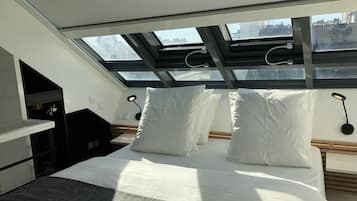 Coffres-forts dans les chambres, fer et planche Ă repasser