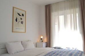 Căn hộ Deluxe, 1 phòng ngủ, không hút thuốc, quang cảnh thành phố | Bộ trải giường bằng vải cotton Ai Cập, bộ đồ giường cao cấp 