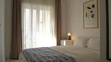 Lägenhet Deluxe - 1 sovrum - icke-rökare - utsikt mot staden | Egyptiska bomullslakan, sängtillbehör av högsta kvalitet och duntäcken