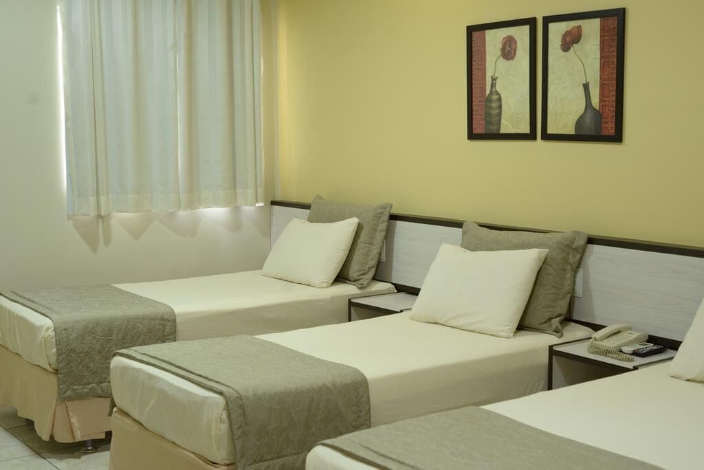 deluxe triple room, multiple beds | minibar, in-room safe, blackout curtains, free wifi