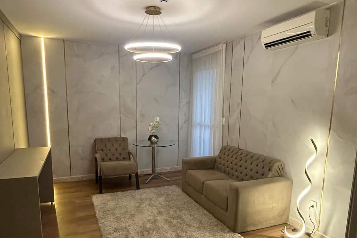 Superior Suite, 1 Queen Bed | Living area | TV