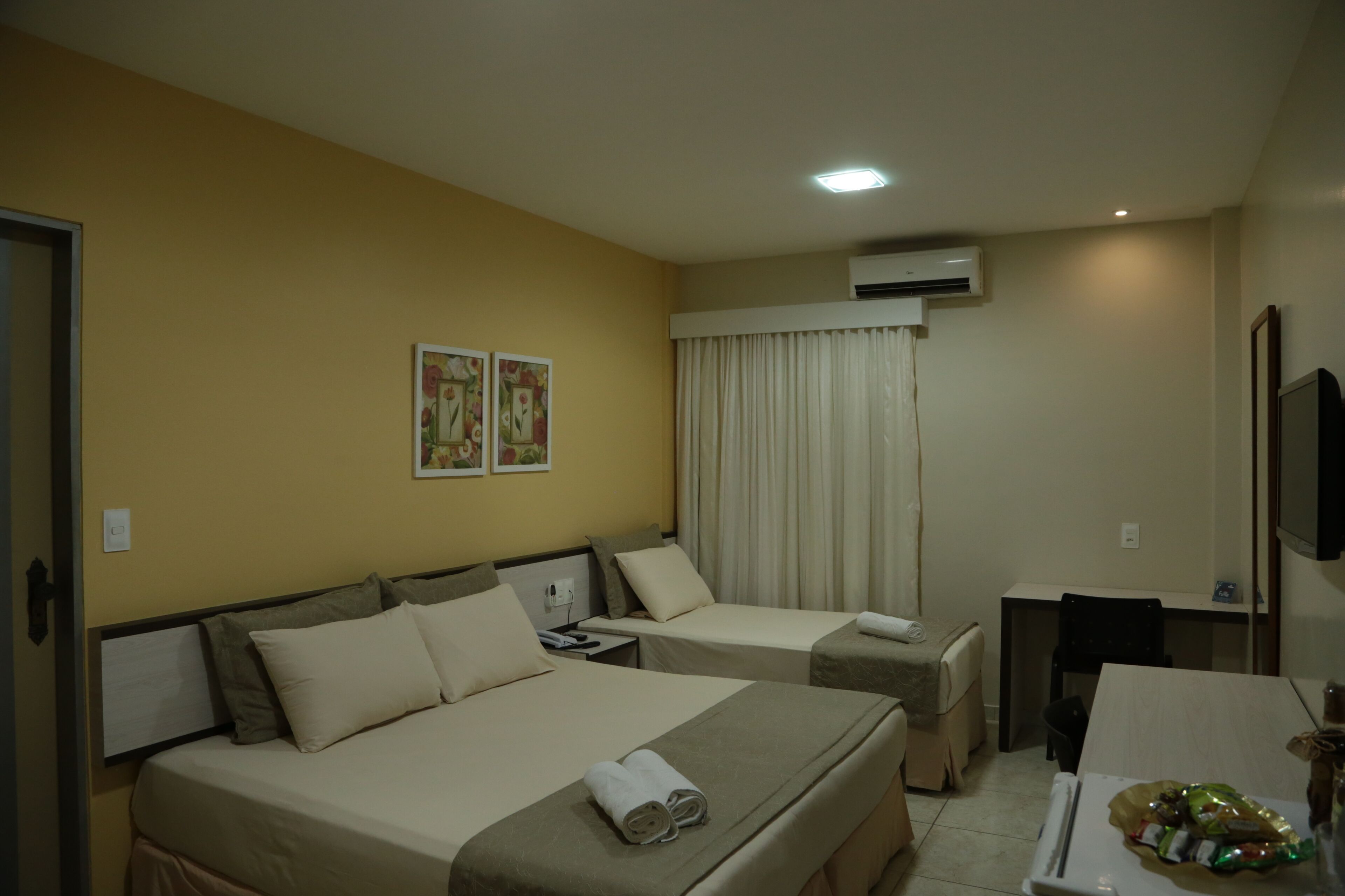 deluxe triple room, multiple beds | minibar, in-room safe, blackout curtains, free wifi