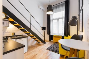 City Studio, 1 Queen Bed, City View | Desk, laptop workspace, blackout curtains, iron/ironing board
