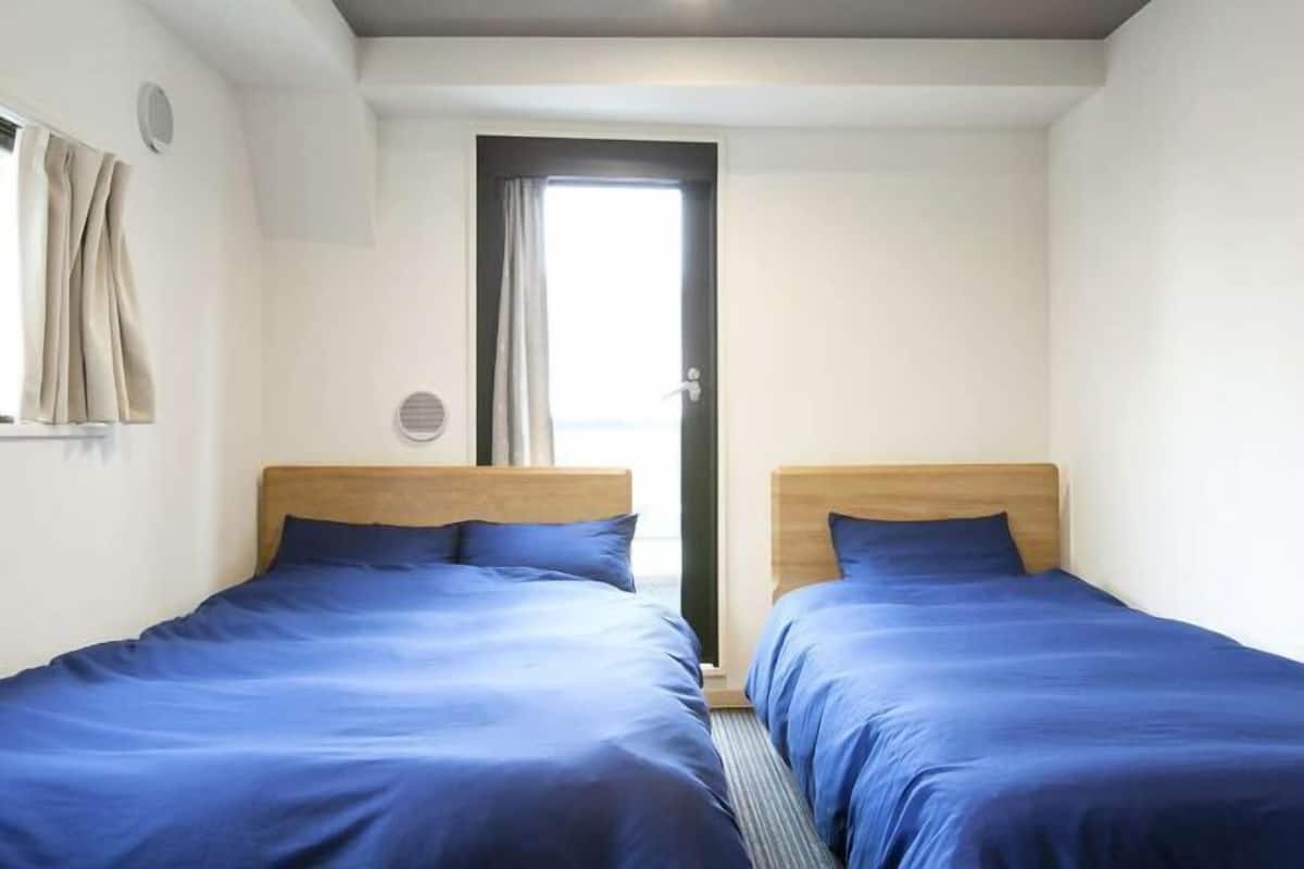 Blackout drapes, soundproofing, iron/ironing board, rollaway beds