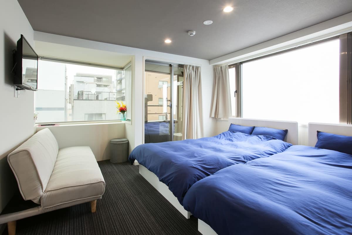Blackout drapes, soundproofing, iron/ironing board, rollaway beds