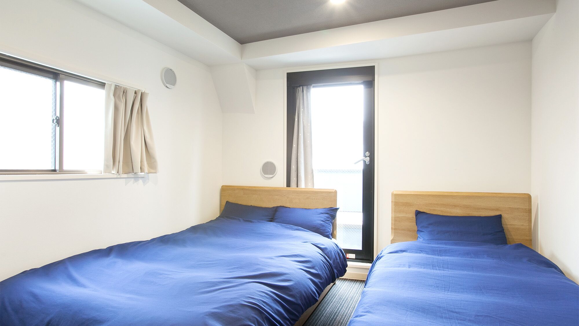 Blackout curtains, soundproofing, iron/ironing board, rollaway beds
