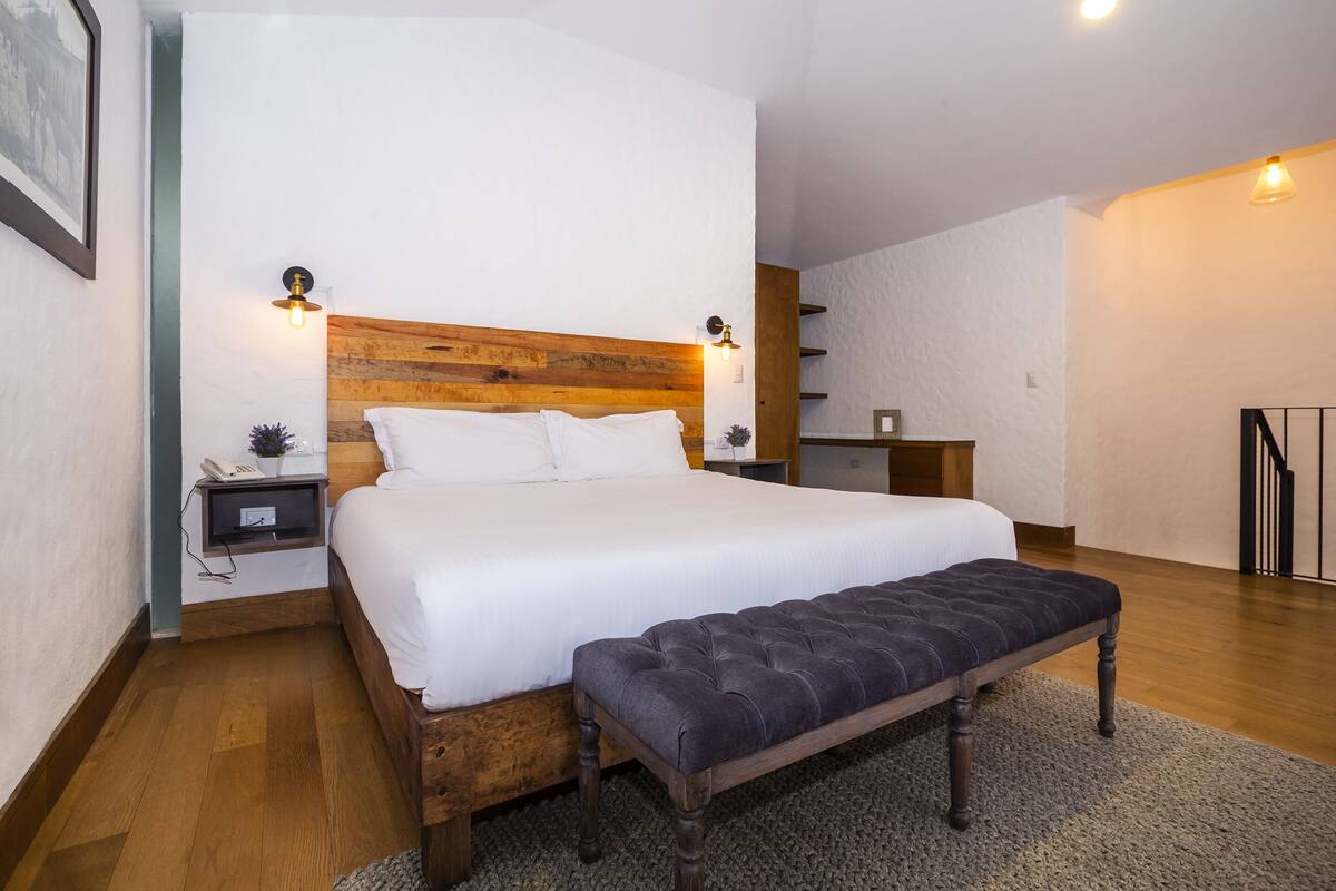 Junior Suite, 1 Bedroom, Garden View | Minibar, in-room safe, free WiFi, bed sheets