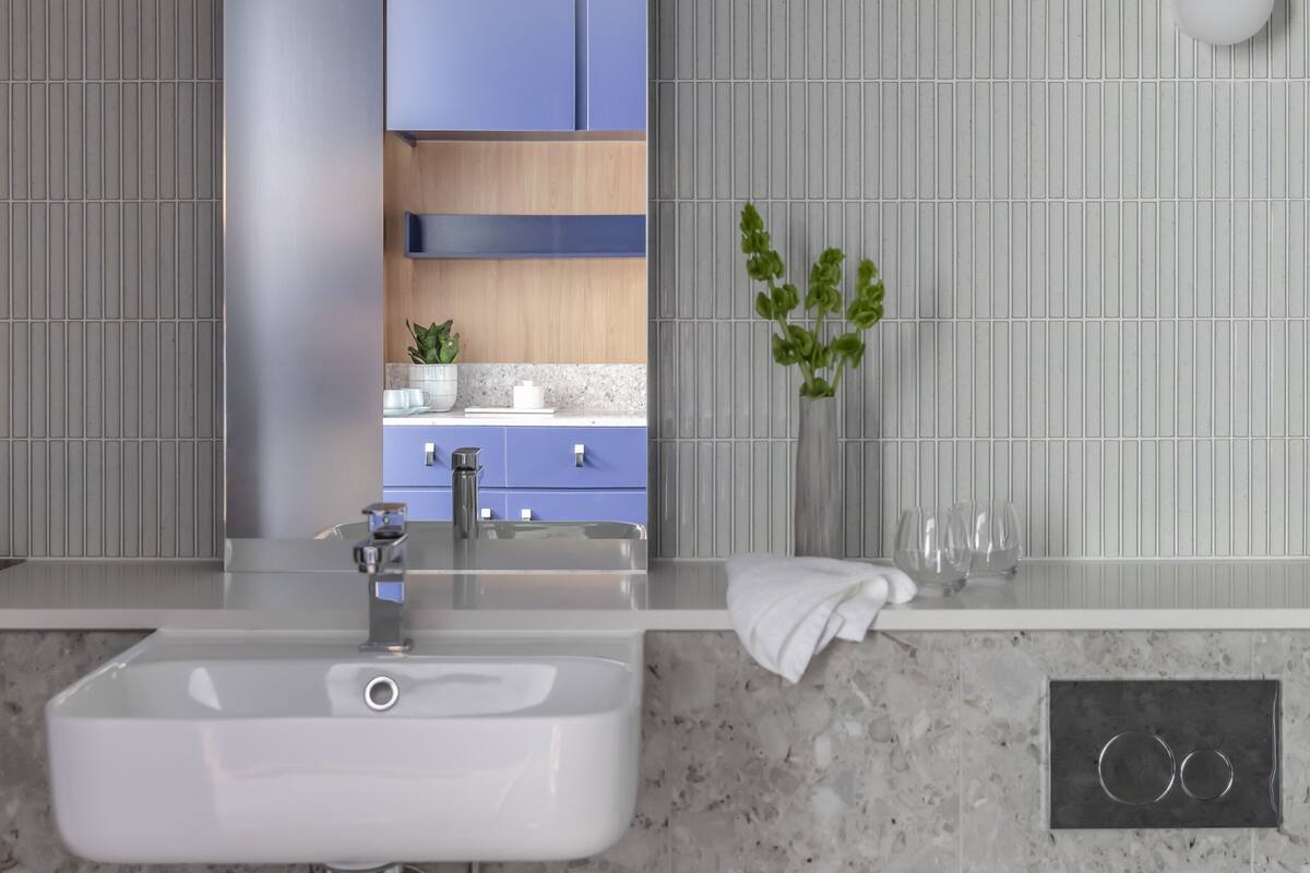 designer toiletries, hair dryer, dressing gowns, towels