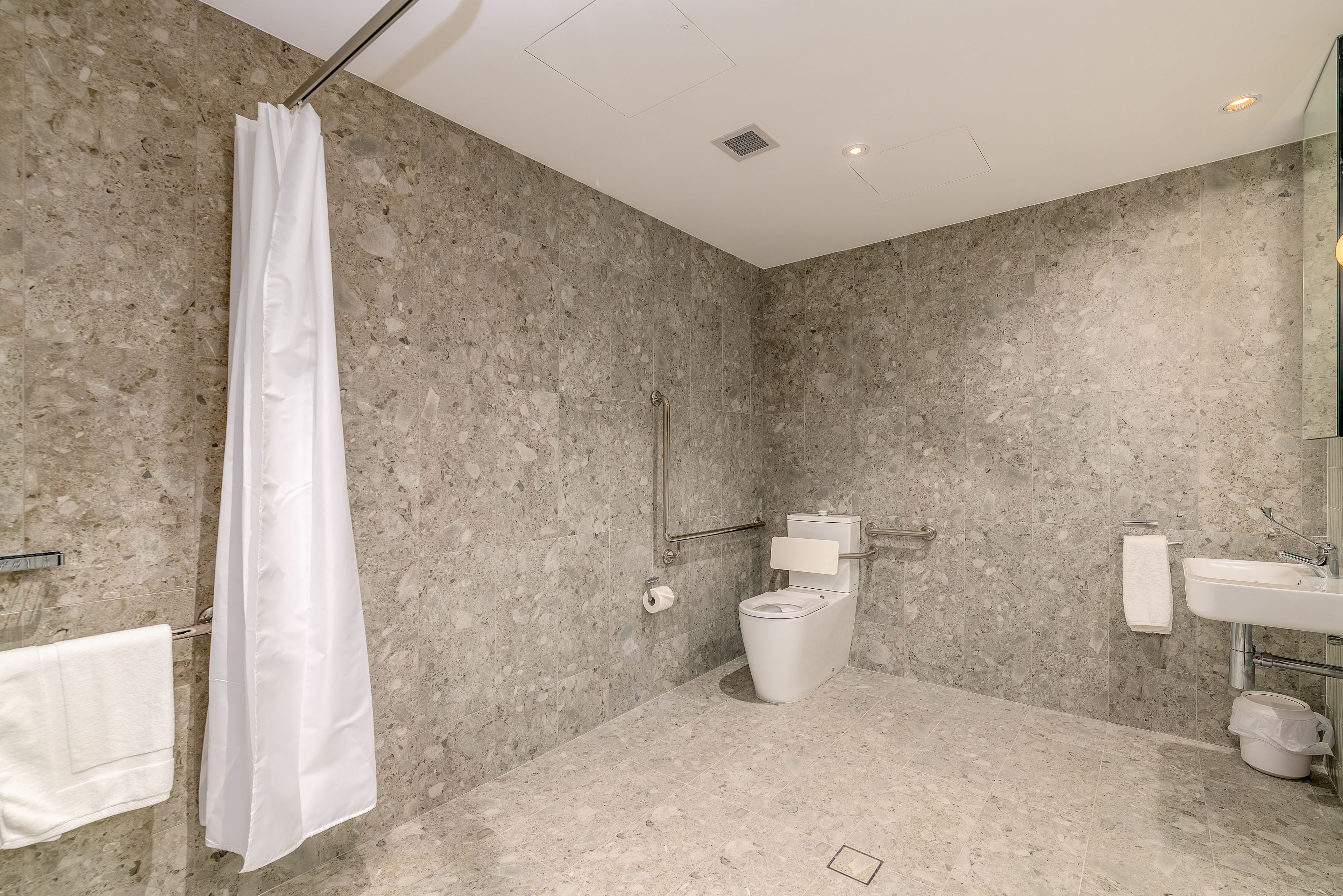 designer toiletries, hair dryer, dressing gowns, towels