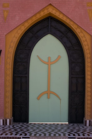 A large arched doorway with a simple, modern design.