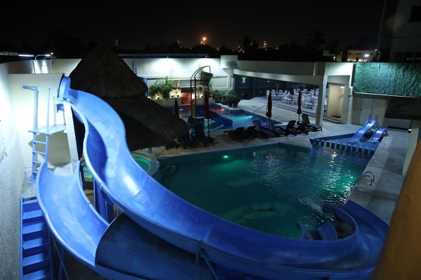 Outdoor pool, open 10:00 AM to 10:00 PM, pool umbrellas, sun loungers
