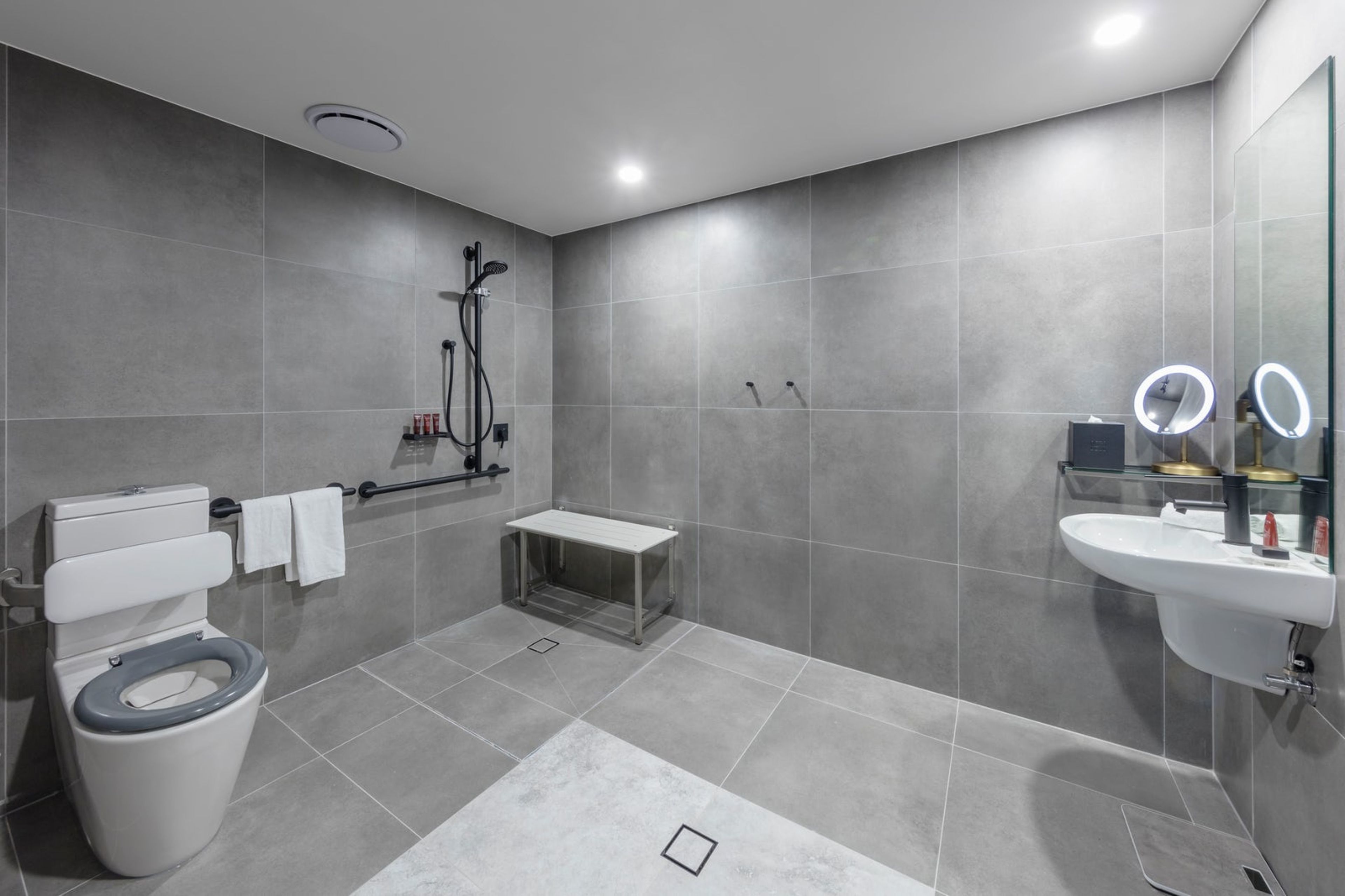 two bedroom accessible apartment | bathroom | shower, rainfall showerhead, designer toiletries, hair dryer