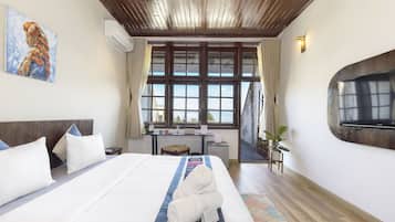 Deluxe Suite, Mountain View | Premium bedding, desk, blackout drapes, free WiFi