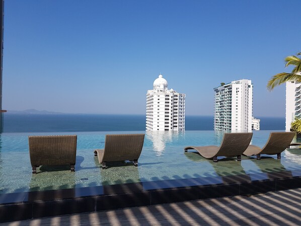 Indoor pool, 3 outdoor pools, open 7:30 AM to 8:00 AM, free pool cabanas
