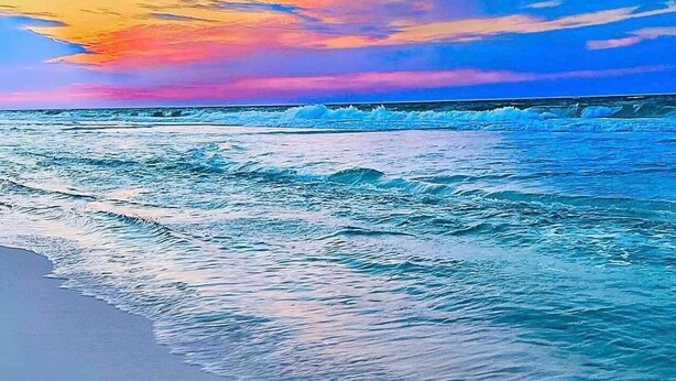 A beach with waves and a colorful sky. - Modern Sandpiper Retreat: 2 King Suites + Resort Golf, Pickleball & Dining (Destin)