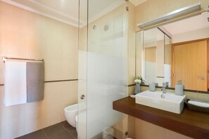 Bathtub, hair dryer, towels, soap