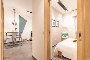 1 غرفة نوم ومكواة/لوح كي وواي فاي وملاءات أسرّة