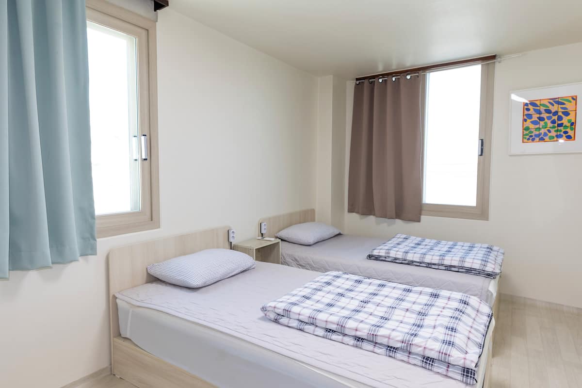 Basic Twin Room | Blackout drapes, soundproofing, free WiFi, bed sheets