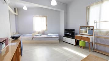 Deluxe Family Room | Blackout drapes, soundproofing, free WiFi, bed sheets