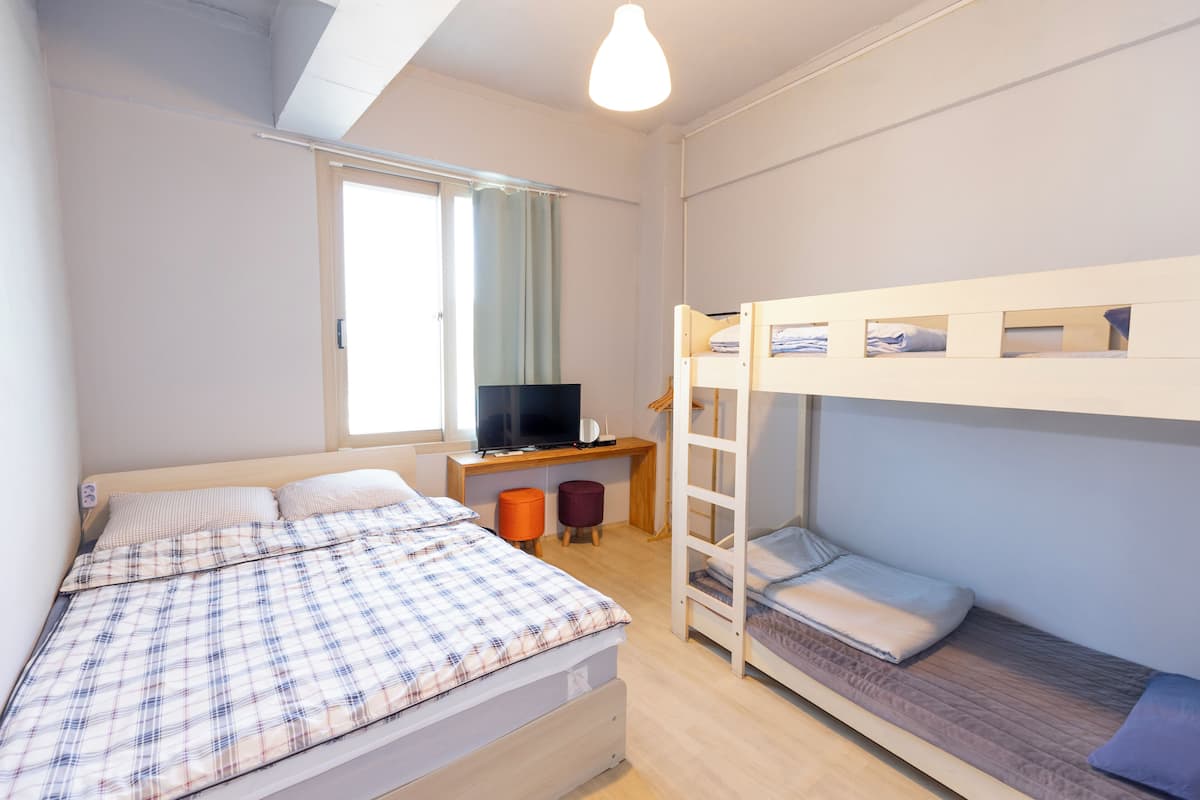 Quadruple Room (1 Double + 1 Bunk Bed) | Blackout drapes, soundproofing, free WiFi, bed sheets