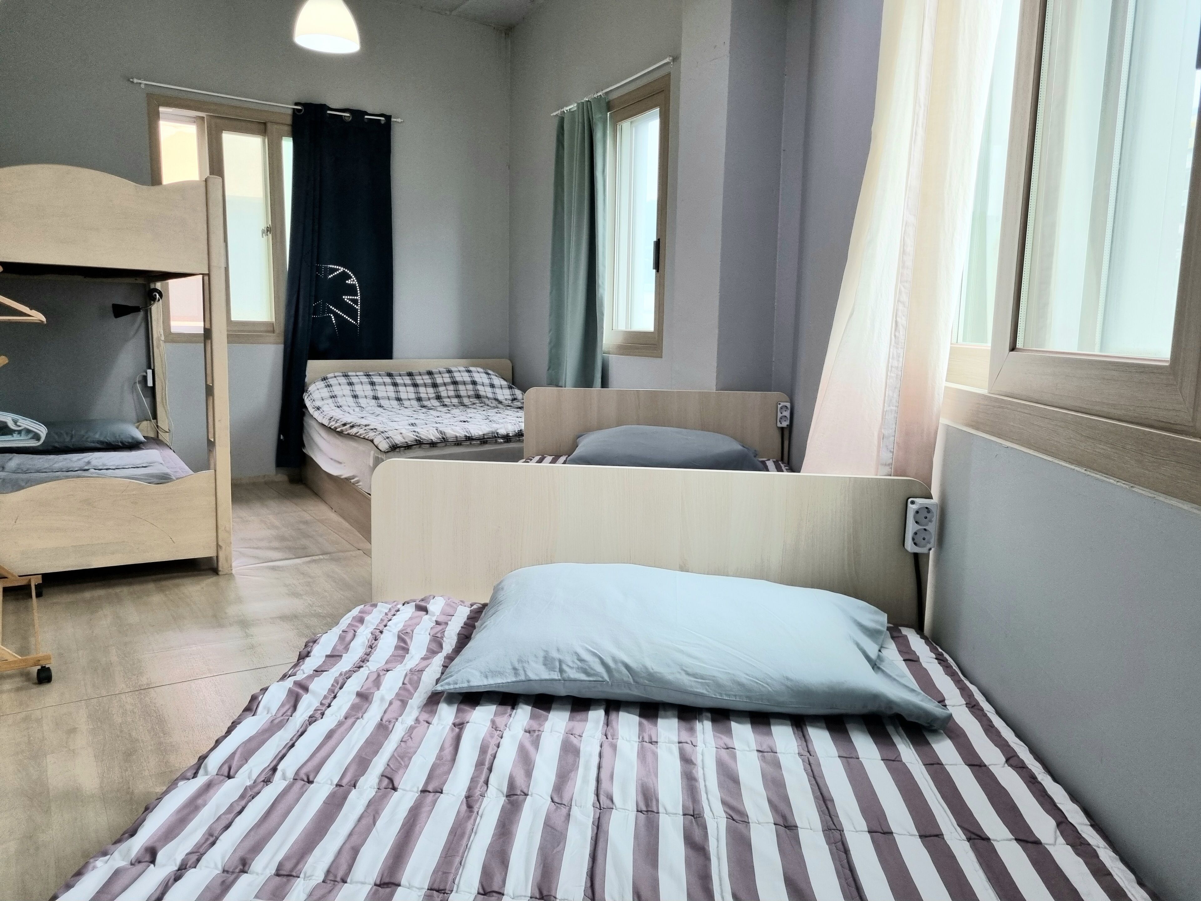 Deluxe Family Room | Blackout drapes, soundproofing, free WiFi, bed sheets