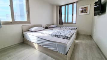 Camera Basic con 2 letti singoli | Tende oscuranti, insonorizzazione, Wi-Fi gratuito, lenzuola