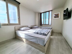 Basic Twin Room | Blackout drapes, soundproofing, free WiFi, bed sheets - Wandonesia (Wando)