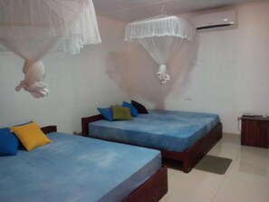 Family Twin Room, Multiple Beds | In-room safe, desk, free WiFi