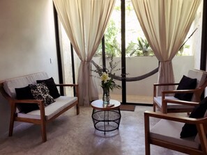 Standard Loft, 1 King Bed, City View | Living area | 32-inch flat-screen TV with cable channels, TV