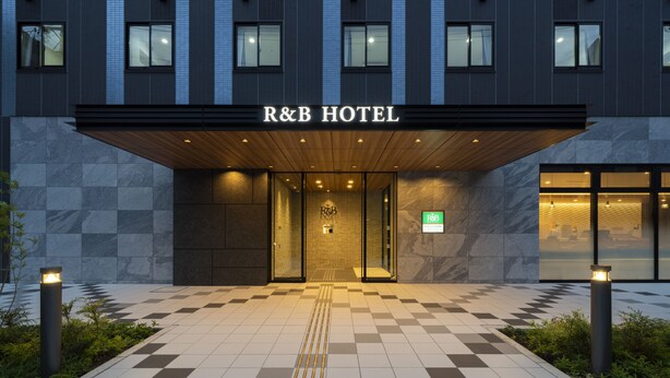 The R&B Hotel entrance with a checkered tile floor, a clear pathway, and a modern facade. - Washington R&B Hotel Nagoya Shinkansenguchi (Nagoya)
