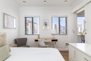 Premier Apartment, 2 Bedrooms, Beach View | Desk, iron/ironing board, cribs/infant beds, free WiFi