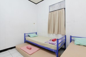Cortinas blackout, wifi gratis y ropa de cama 