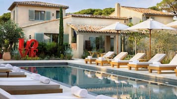 Seasonal outdoor pool, pool umbrellas, pool loungers