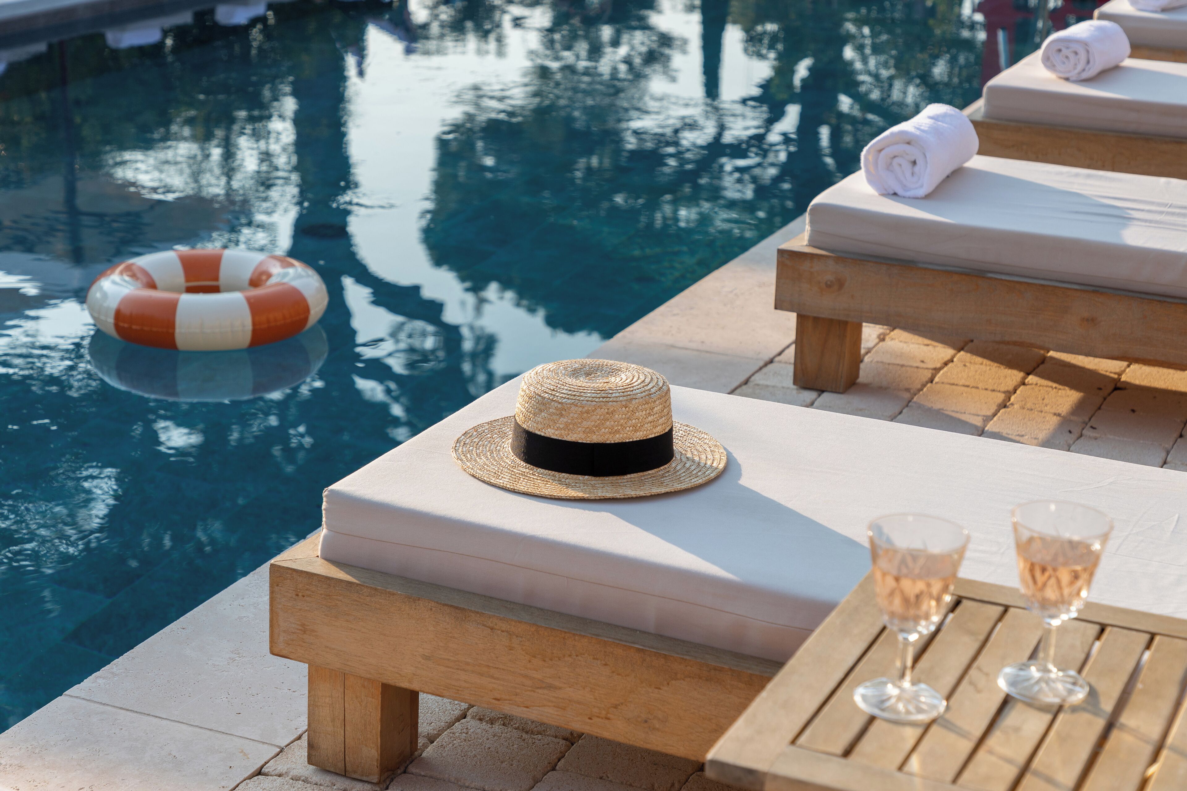 seasonal outdoor pool, pool umbrellas, pool loungers