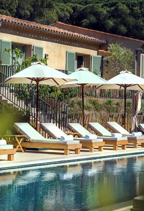 Seasonal outdoor pool, pool umbrellas, pool loungers