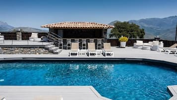 Seasonal outdoor pool, pool umbrellas, sun loungers