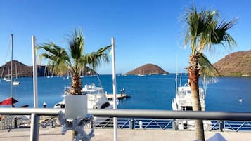 Beach nearby, white sand, beach towels