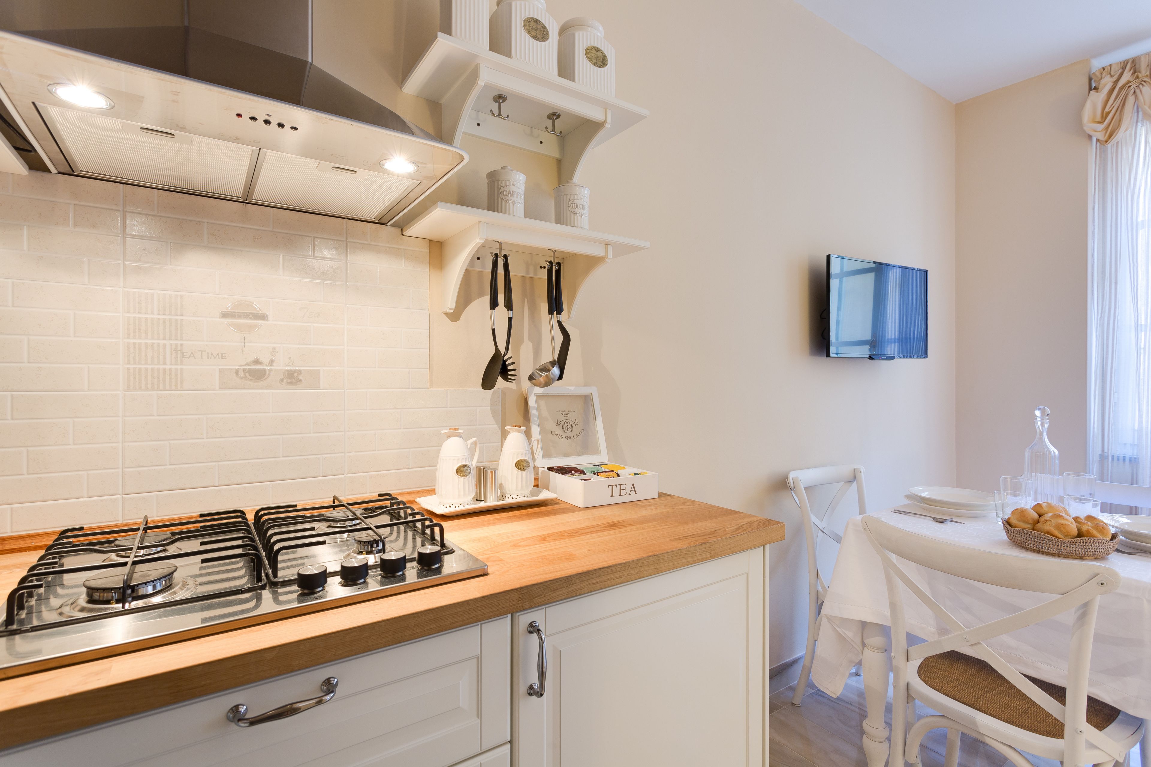Apartamento, 1 quarto | Cozinha americana privada | Geladeira, cooktop, talheres/pratos/utensílios de cozinha
