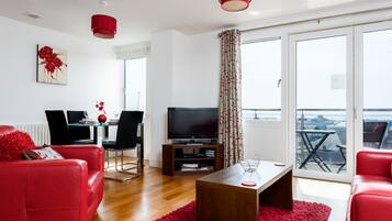 House (1 Bedroom) | Living area | Flat-screen TV, DVD player